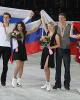 The European ice dancing medalists pose with their flags
