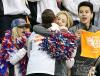 Gracie Gold hugs Jason Brown as he leaves the ice