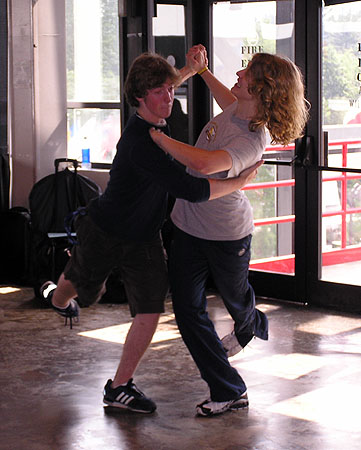 John Corona and Chase Fishbaw goof off in the warm-up area