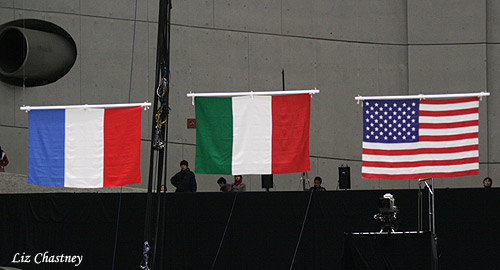 The flags of the medalists, France, Italy, USA