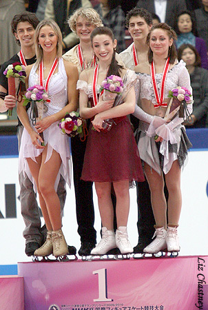 The NHK dance medalists atop the pink podium