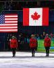 The Olympic ice dance champions' flags are raised