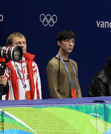 Johnny Weir watches training partner Ksenia Makarova