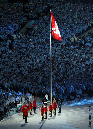 The Canadian flag is raised