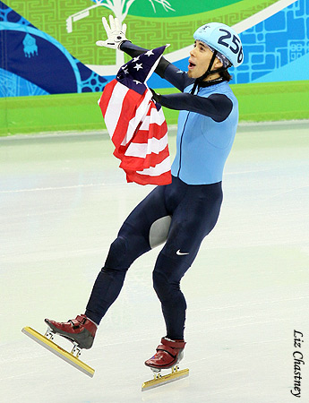 Apolo Ohno with the American flag