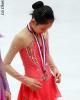 Junior Ladies: Zijun Li (CHN) checks out her medal
