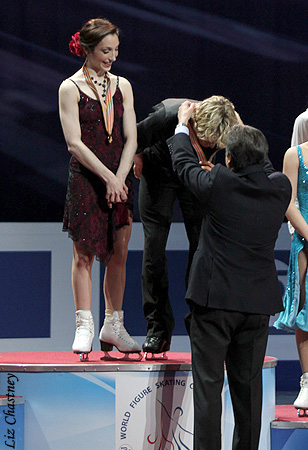 Meryl Davis &amp; Charlie White receive the first-ever gold medal in ice dance to a team from USA