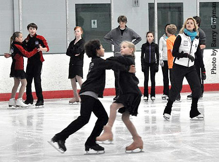 Belbin watches Katherine Gourianova &amp; Caleb Wein while other teams wait for their turn