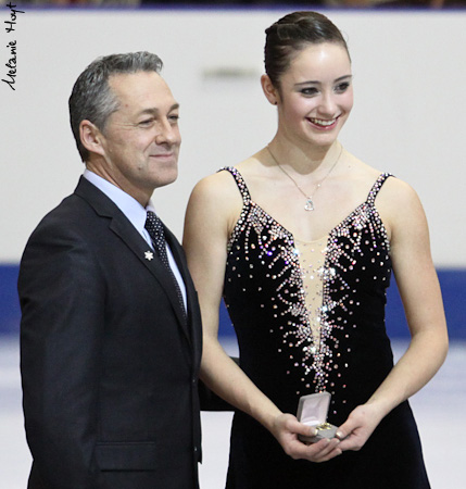Benoit Lavoie presents Kaetlyn Osmond with the Otto Gold pin