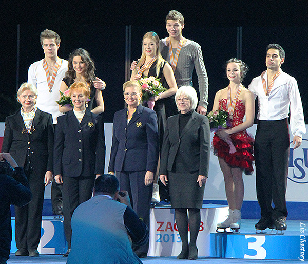 Posing with event officials