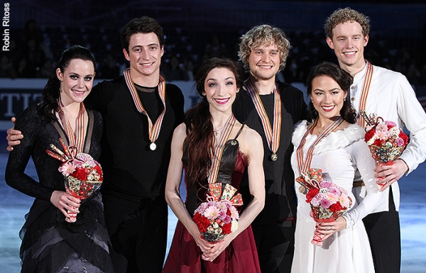 The 2013 Four Continents ice dance champions pose for photographers
