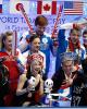 An excited Team Russia reacts to Bobrova & Soloviev's marks